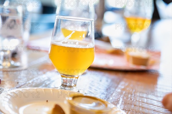 Abstract of small glass of micro brew beers on bar