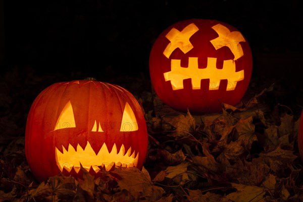 Glowing pumpkins at night