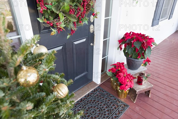 Christmas decorations at front door of house