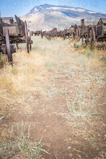 Abstract of vintage antique wood wagons and wheels