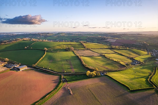 Devon Fields and Farmlands at sunset time from a drone over Labrador Bay