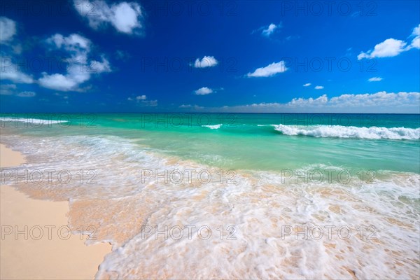 Beautiful beach and waves of Caribean Sea