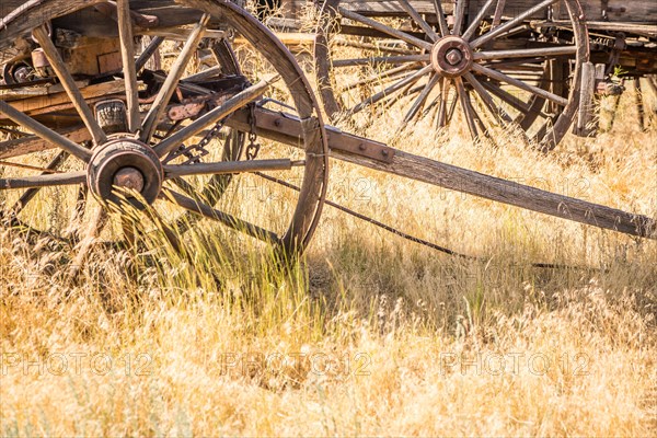 Abstract of vintage antique wood wagons and wheels