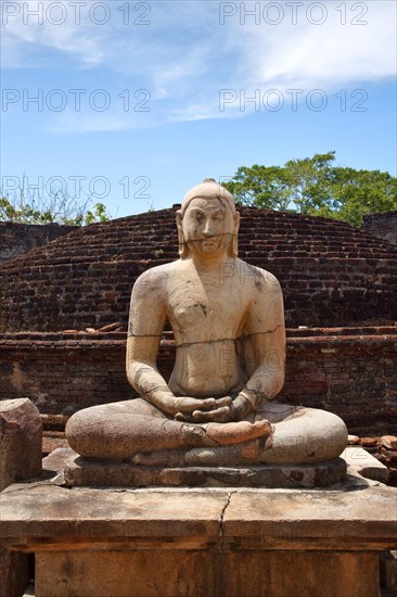 Ancient sitting Buddha image in votadage Pollonaruwa