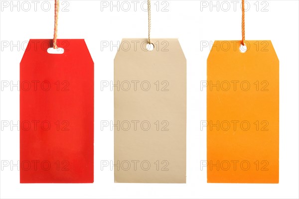 Three multicolored paper tags isolated on white background