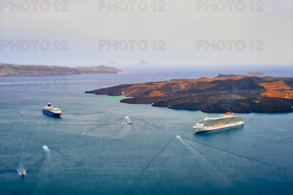 Cruise ships and tourist boats in sea Greek isaldn Santorini