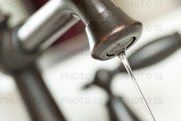 Close-up of water dripping from water faucet