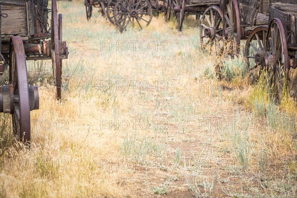 Abstract of vintage antique wood wagons and wheels