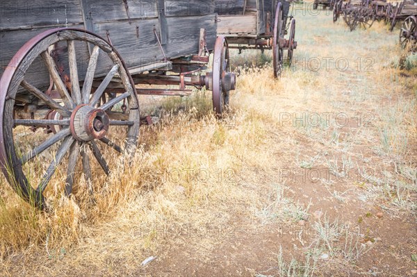 Abstract of vintage antique wood wagons and wheels