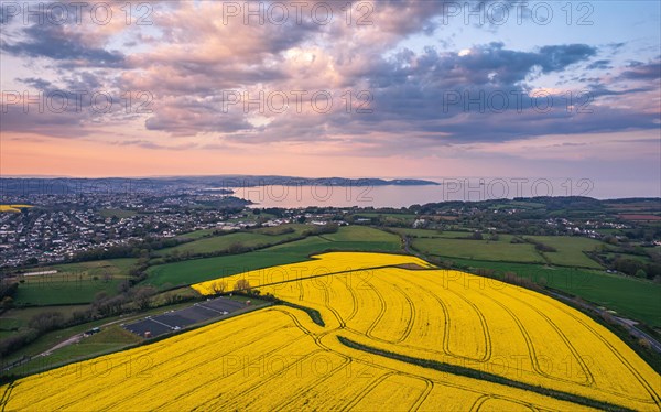 Sunset over Devon Fields and Farmlands from a drone