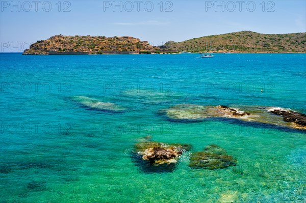 Island of Spinalonga with old fortress former leper colony and the bay of Elounda