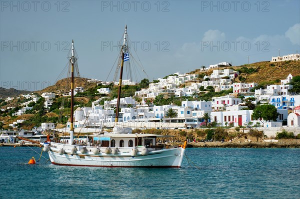 Vessel schooner moored in port harbor of Chora town