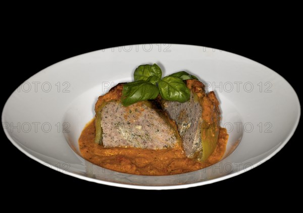 Peppers stuffed with minced meat and braised in tomato ragout