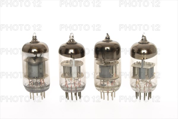 Old vacuum tubes on white background