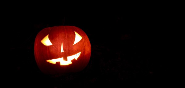 Glowing pumpkins at night