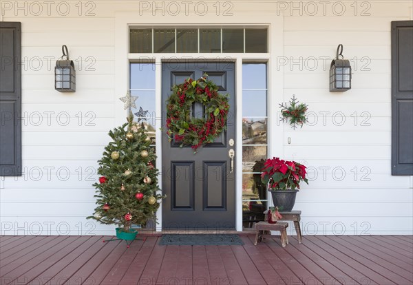Christmas decorations at front door of house