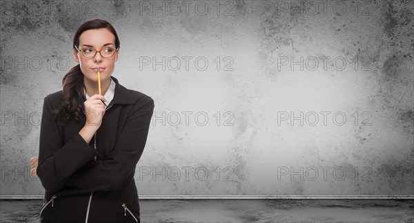 Young adult woman with pencil