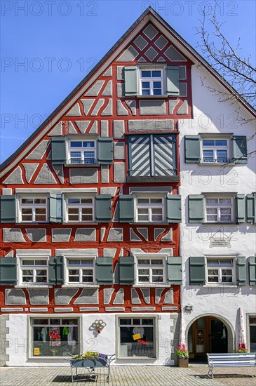 Half-timbered house with divided facade