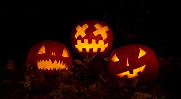 Glowing pumpkins at night