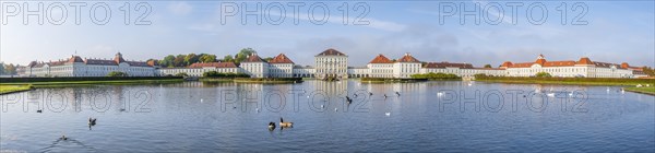 Lake with swans in front of Nymphenburg Palace