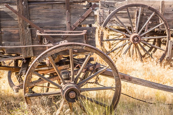 Abstract of vintage antique wood wagons and wheels