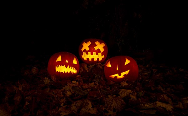 Glowing pumpkins at night