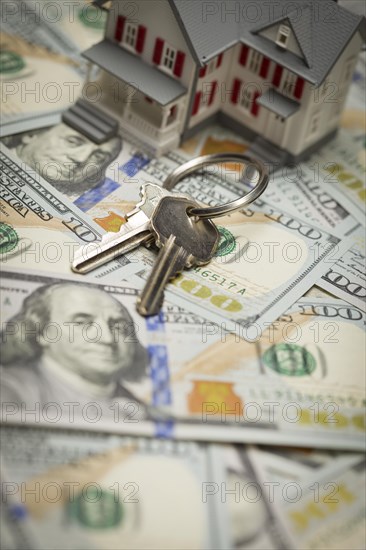 Small model house and keys on newly designed