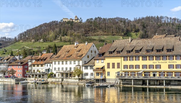 Picturesque view of the half-timbered houses and Hohenklingen Castle at the top of the hill