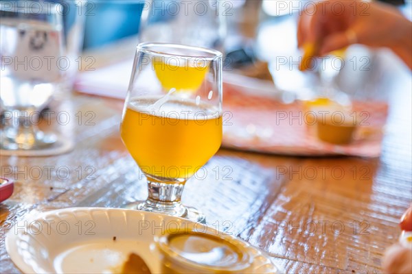 Abstract of small glass of micro brew beers on bar