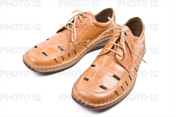 Two man's summer shoes isolated on white background