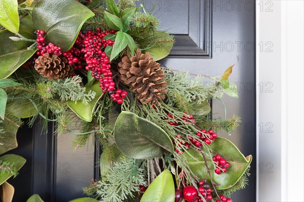 Christmas decorations at front door of house