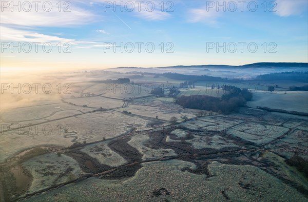 RSPB Exminster and Powderham Marshes and River Exe from a drone at sunrise