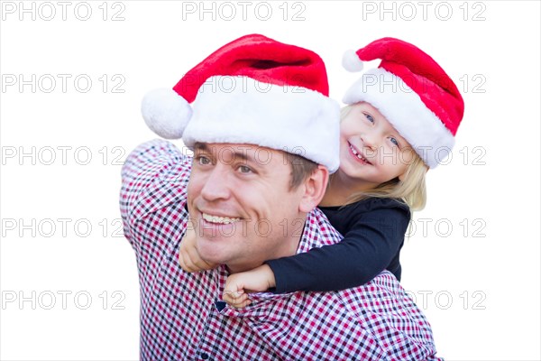 Happy father and daughter wearing santa hats isolated on white background