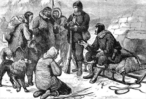 Eskimos and fur hunters talking in front of an igloo