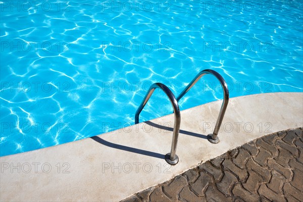 Metal ladder to swimming pool