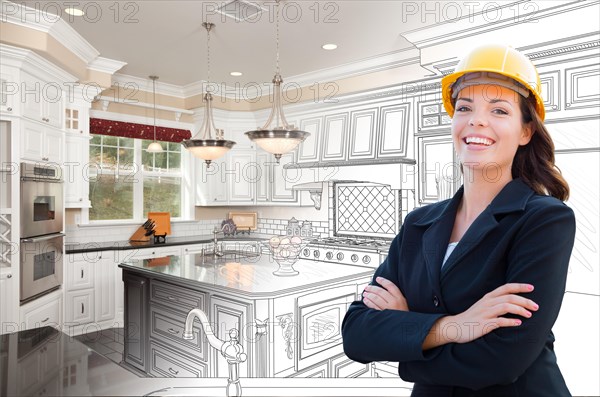 Smiling female contractor over kitchen drawing gradating to photo