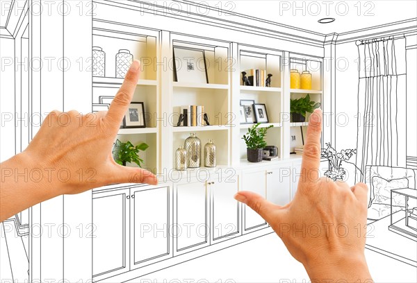 Hands framing custom built-in shelves and cabinets design drawing with section of finished photo