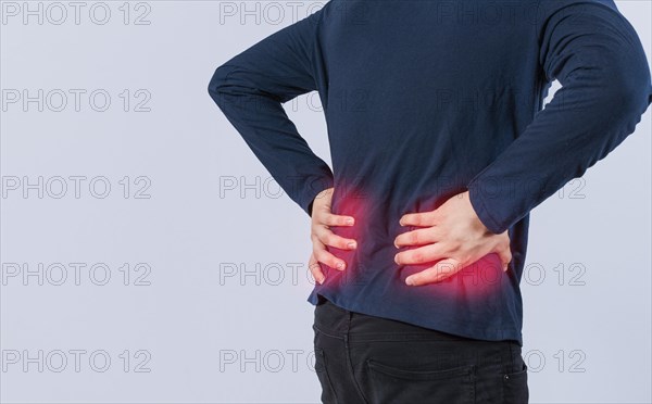 Person with back problems on isolated background