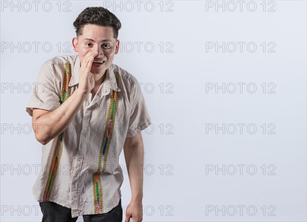 Man speaking discreetly to the camera