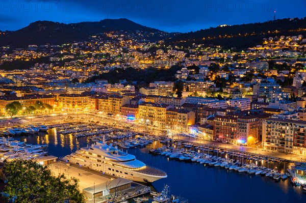 View of Old Port of Nice with luxury yacht boats from Castle Hill