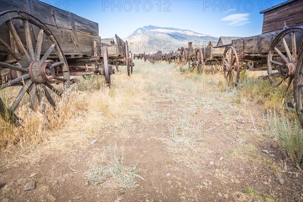 Abstract of vintage antique wood wagons and wheels