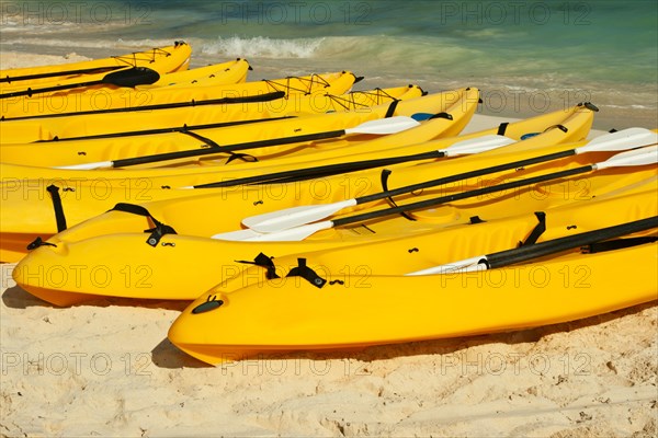 Kayaks on the beach sand