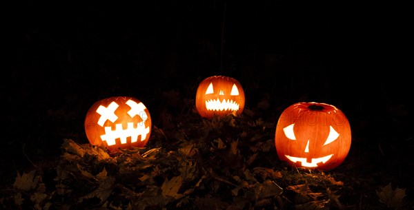 Glowing pumpkins at night