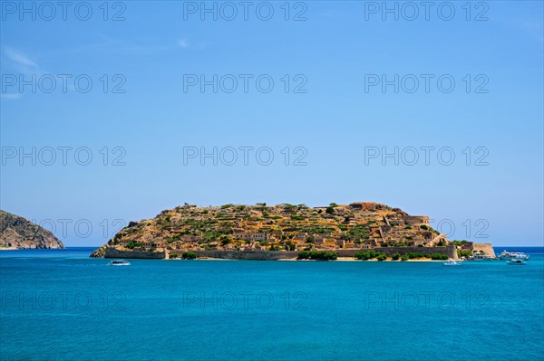 Island of Spinalonga with old fortress former leper colony and the bay of Elounda