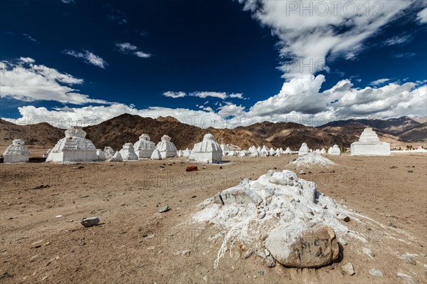 Whitewashed Buddhist chortens Tibetan Buddhist stupas