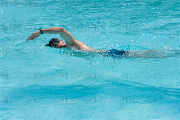 Swimming young man