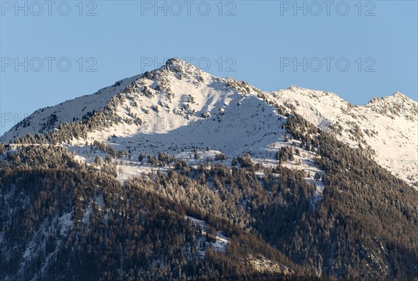 North side of the snowy summit pyramid Dent de Nendaz