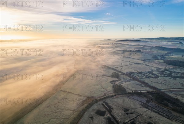 RSPB Exminster and Powderham Marshes and River Exe from a drone at sunrise