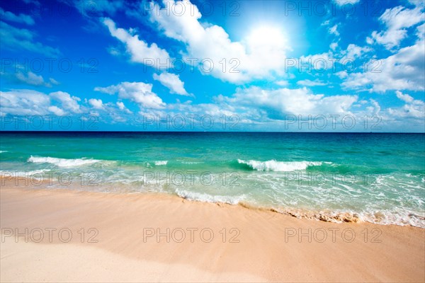 Beautiful beach and waves of Caribbean Sea