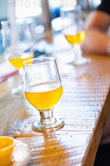 Abstract of small glass of micro brew beers on bar